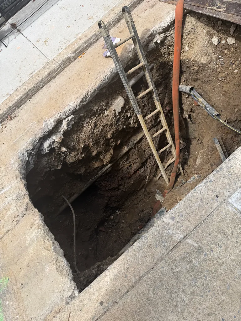 hole in Mildred St.