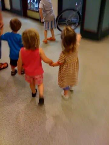 anika and martha holding hands