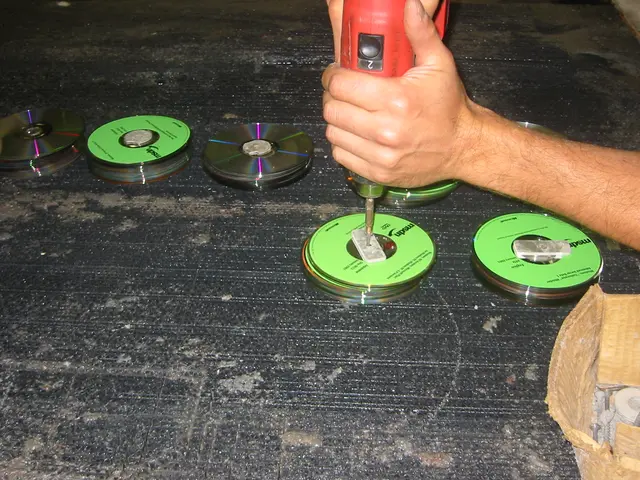 destroying old msdn discs, img_1779