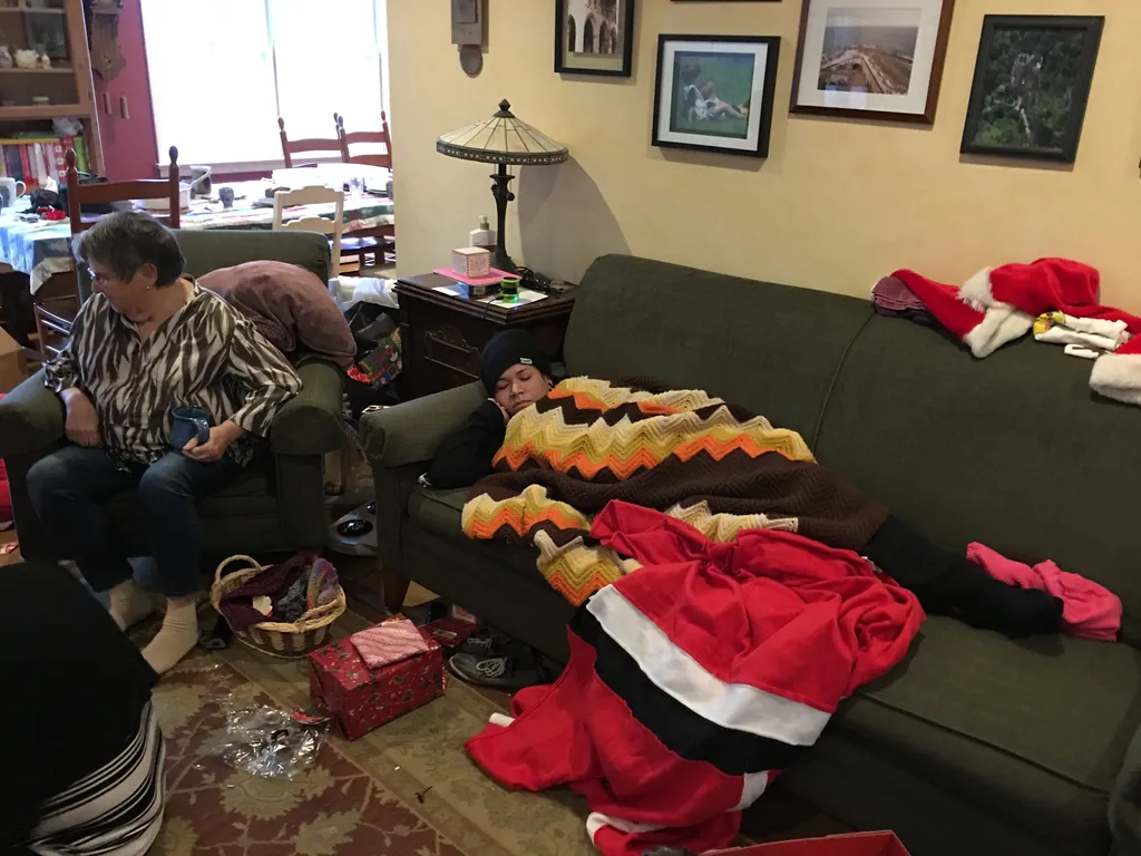 Cam sleeps through presents