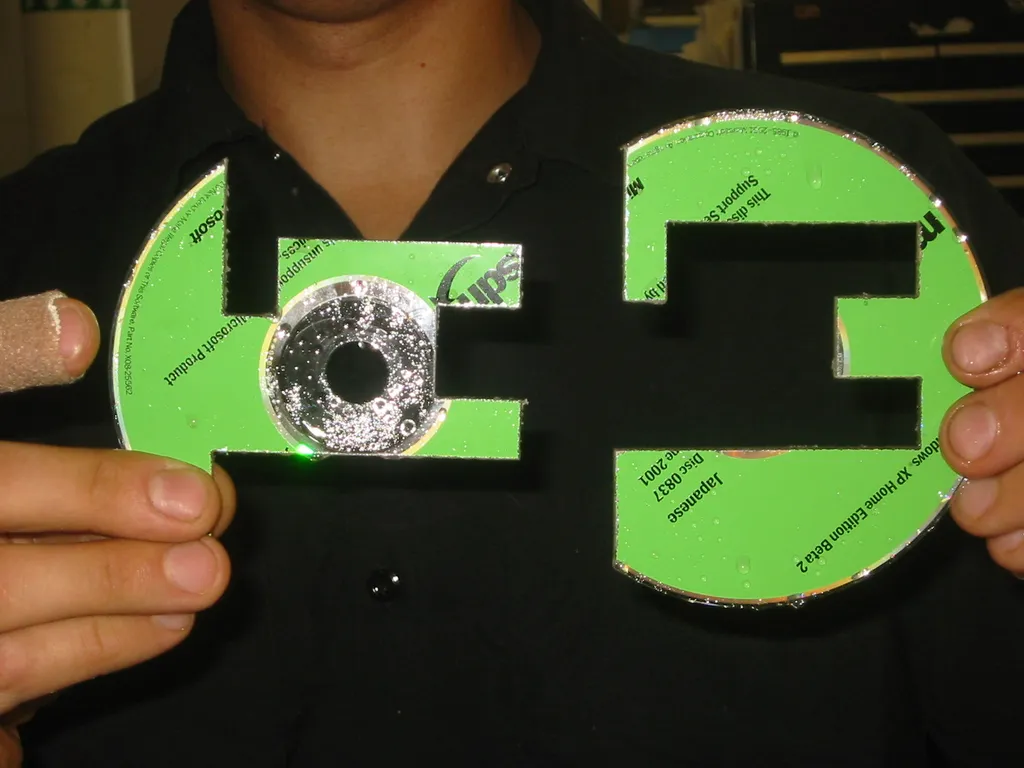 destroying old msdn discs, img_1789