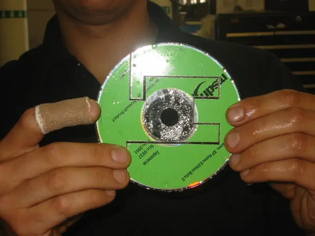 destroying old msdn discs, img_1790