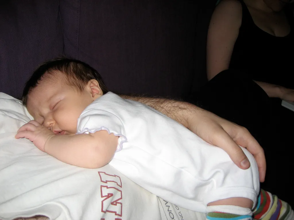 sleeping on daddy's chest