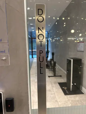 hotel gym door sign