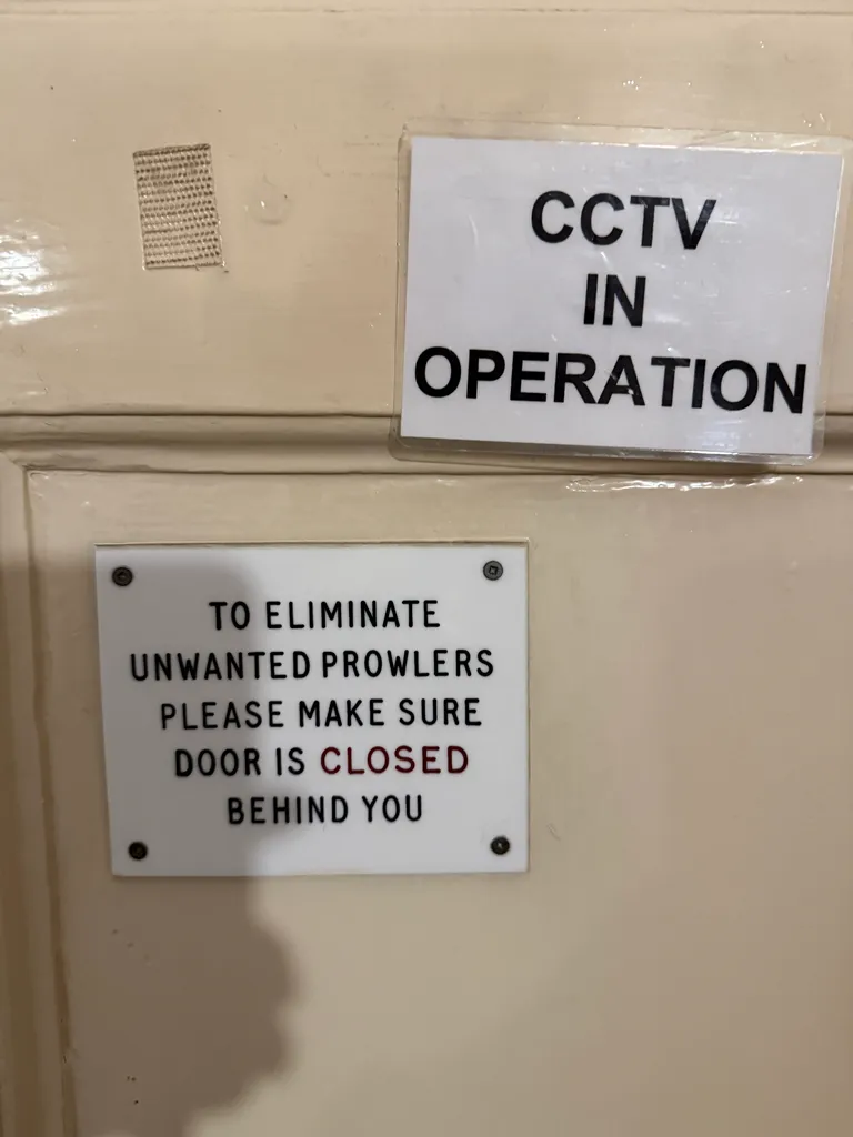 inside hotel door warning