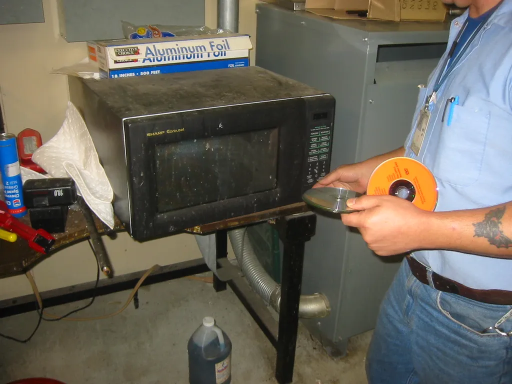 destroying old msdn discs, img_1767