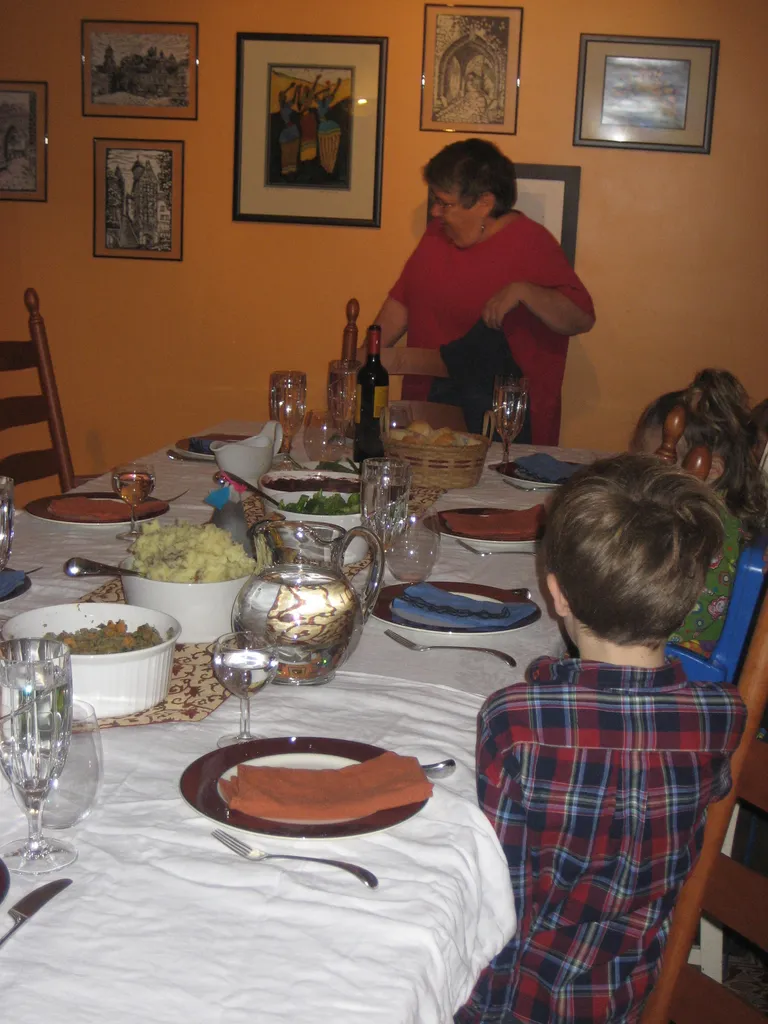 sitting down to thanksgiving dinner