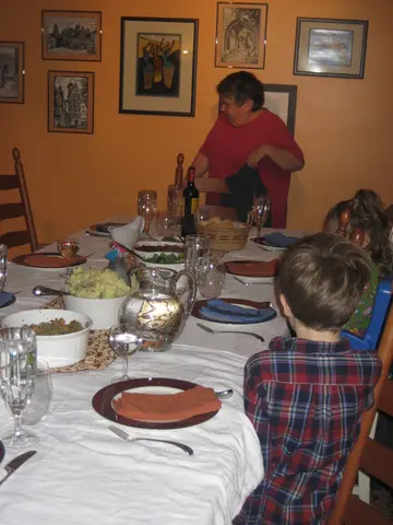 sitting down to thanksgiving dinner