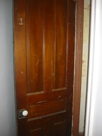 unpainted surface of a door
