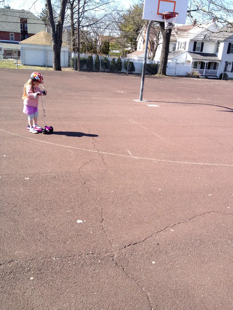 scooting at the park