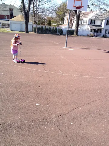 scooting at the park