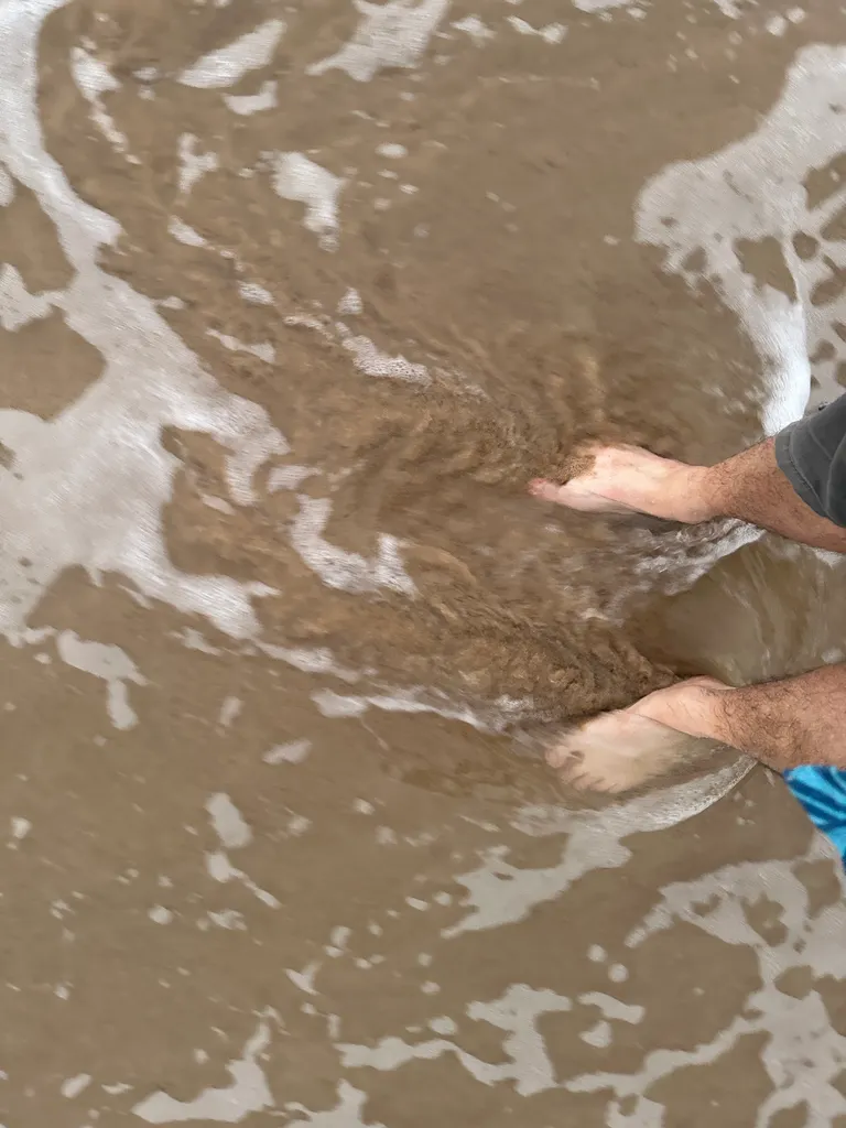 standing in the surf