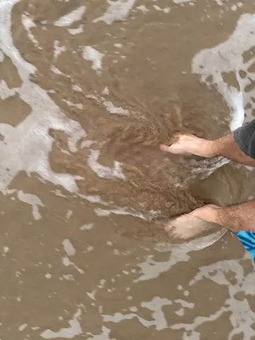 standing in the surf