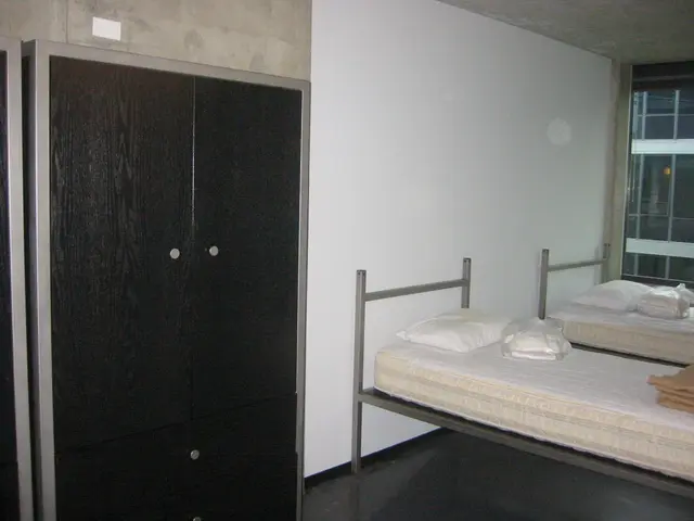 note the concrete wall