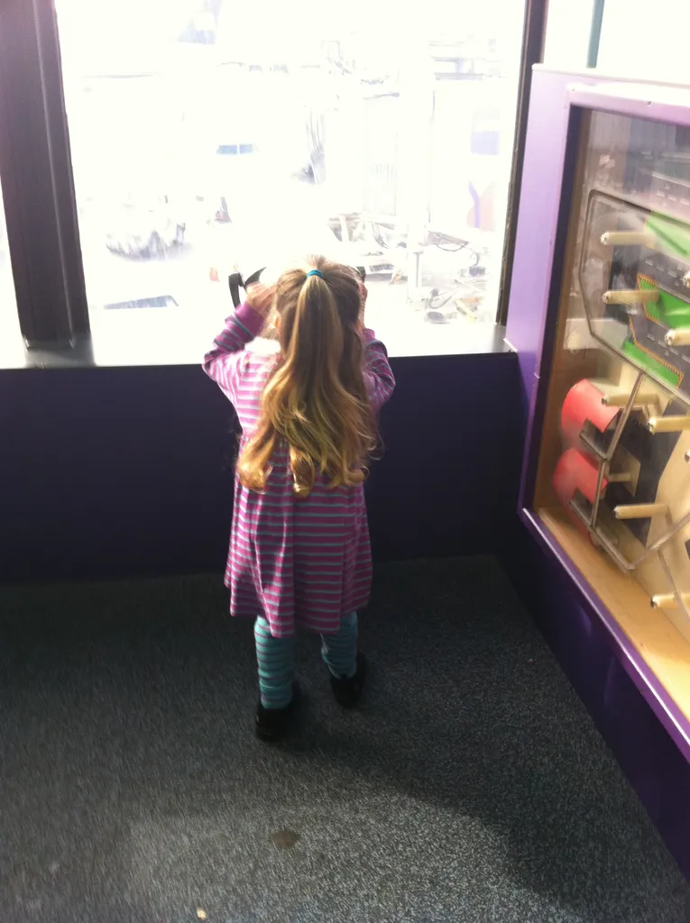 Martha gazes out the airport window