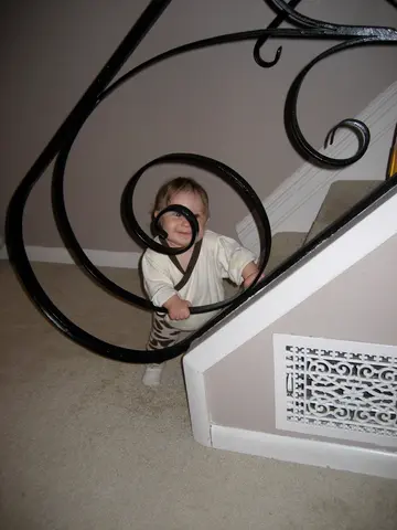 martha hides behind the banister