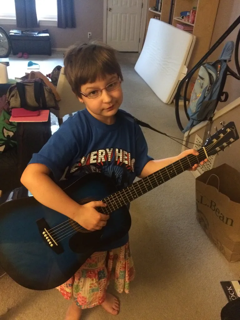 kid and guitar