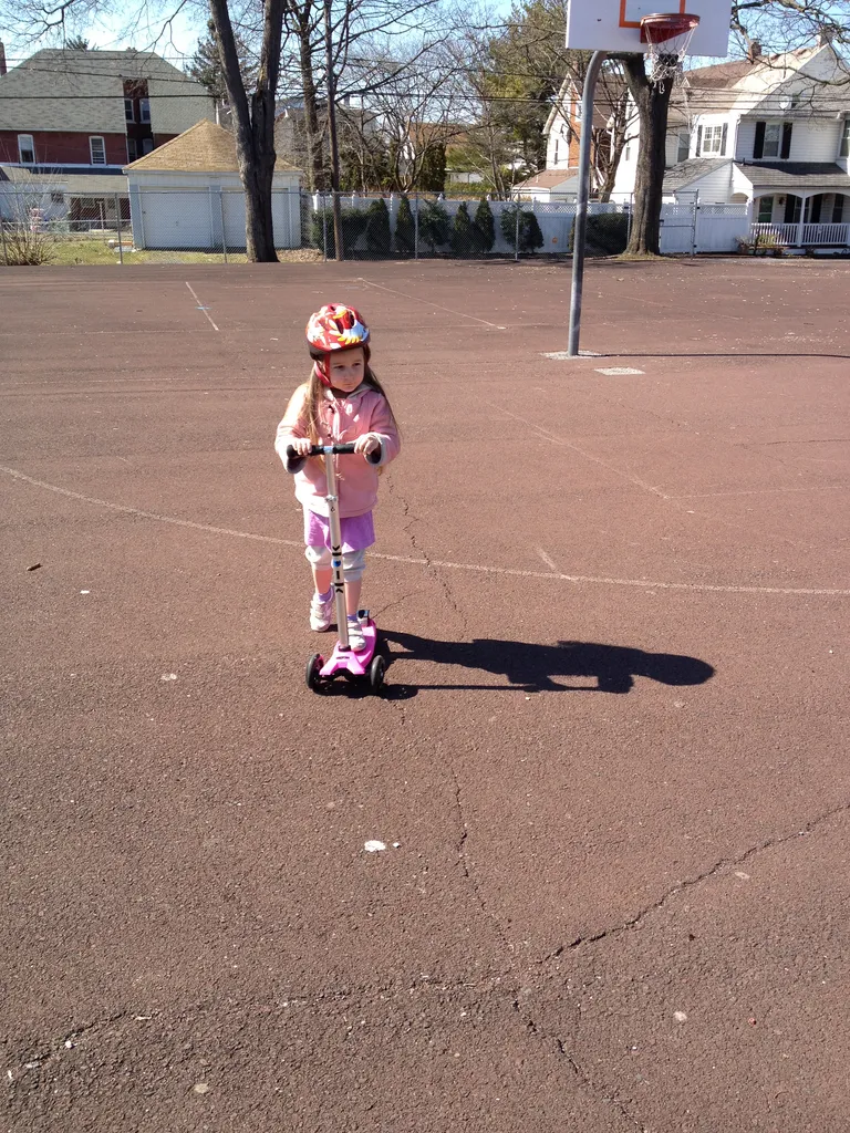 scooting at the park