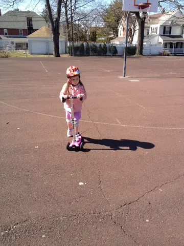 scooting at the park