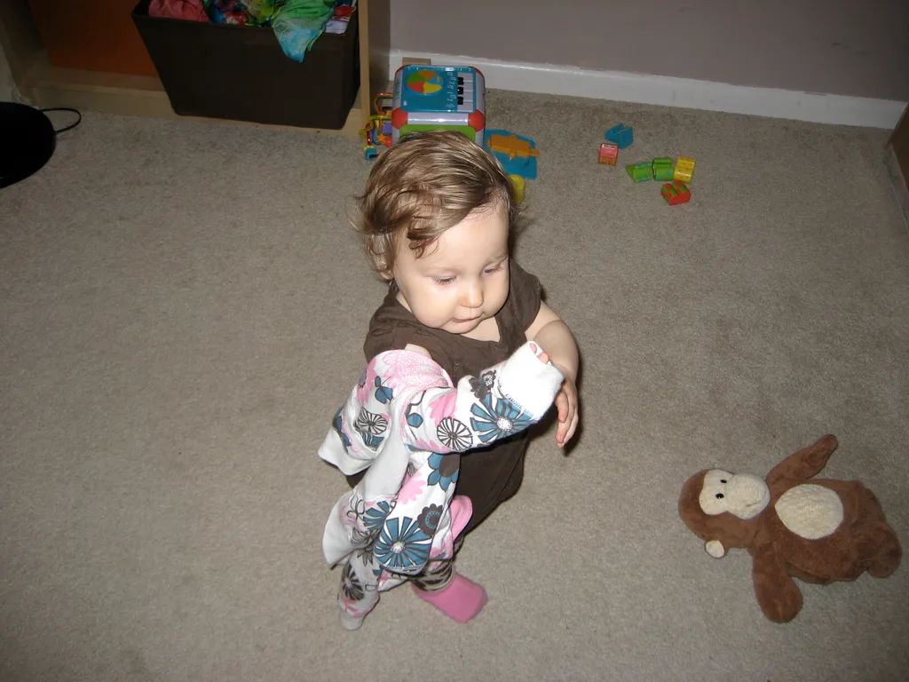trying to dress herself