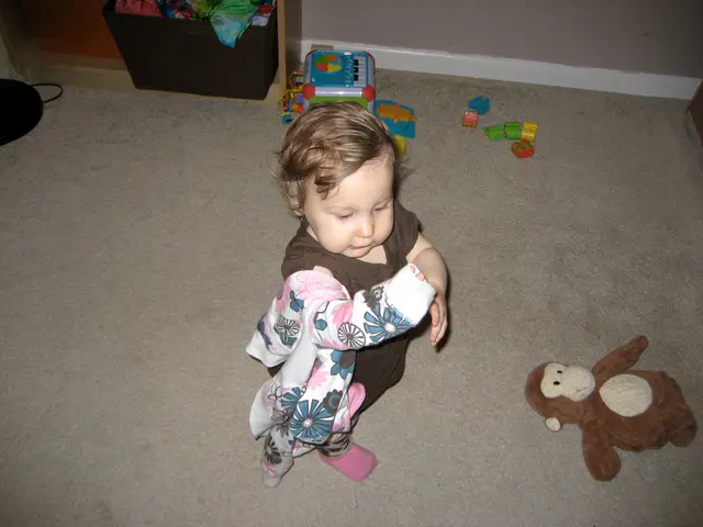 trying to dress herself