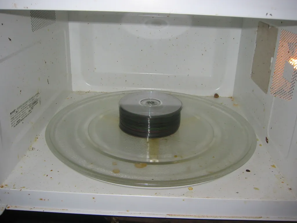 destroying old msdn discs, img_1771