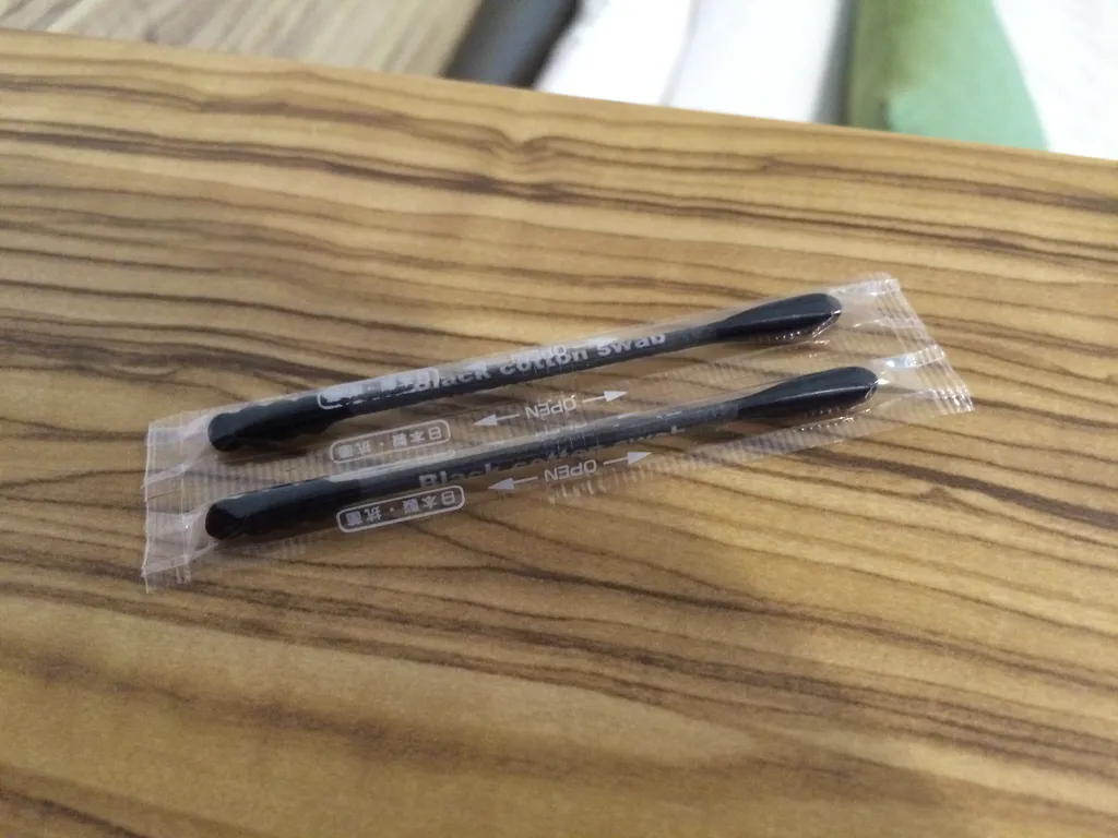 black cotton swabs