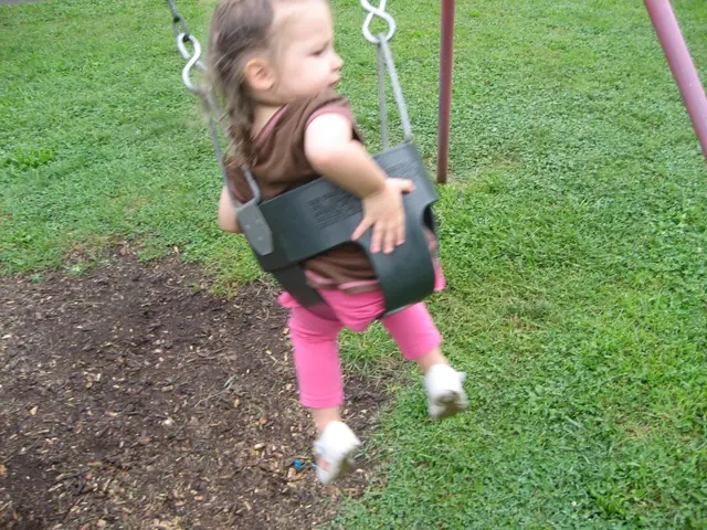 martha pushes herself on the swing