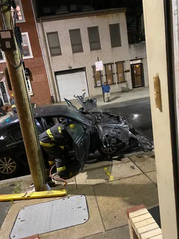 a car burned in front of our house