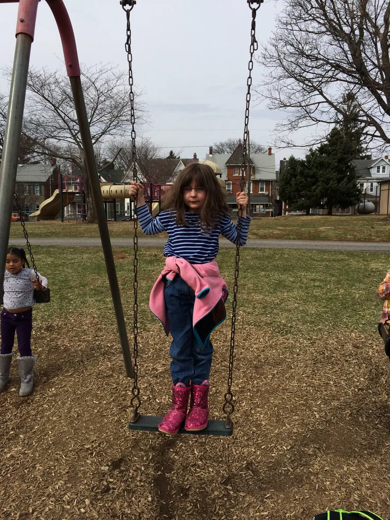 standing on the swing