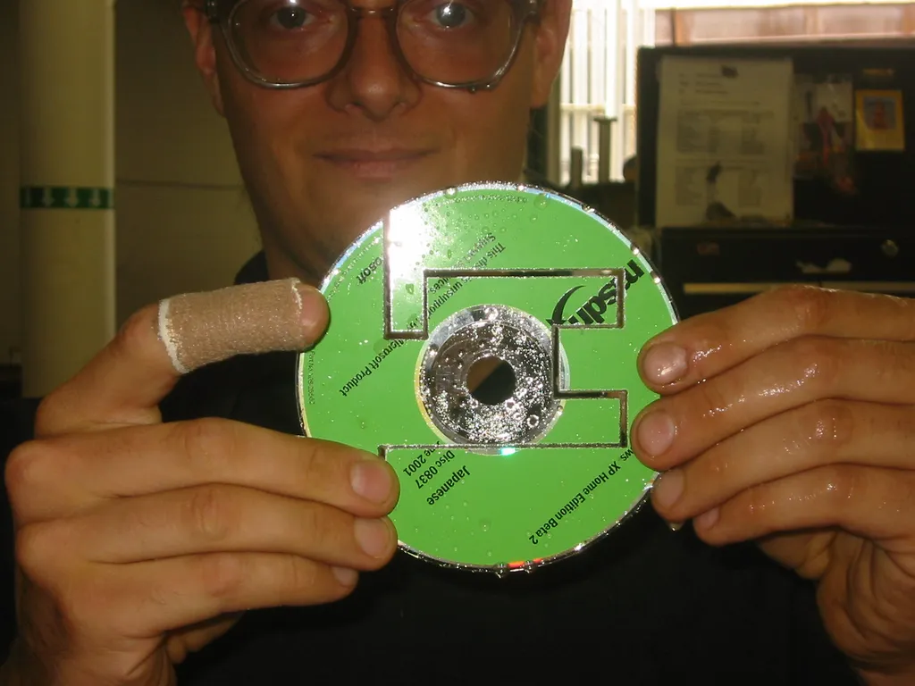 destroying old msdn discs, img_1788