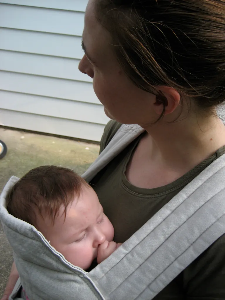 sleeping, riding, sucking her thumb